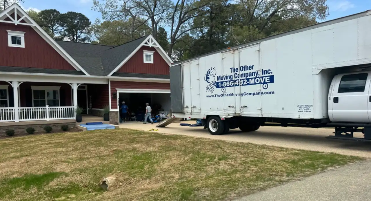 The Other Moving Company's truck parked somewhere in Williamsburg VA